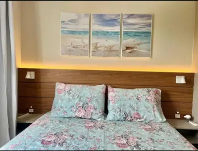 Uma cama ou camas num quarto em Canto dos pássaros