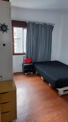 Uma cama ou camas num quarto em Reveillon mínimo 5 dias - Apartamento 2 quartos com Ar e Garagem 100m mar