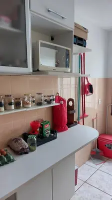 A cozinha ou kitchenette de Reveillon mínimo 5 dias - Apartamento 2 quartos com Ar e Garagem 100m mar