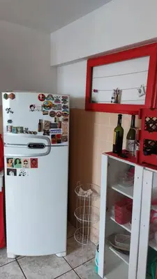 A cozinha ou kitchenette de Reveillon mínimo 5 dias - Apartamento 2 quartos com Ar e Garagem 100m mar