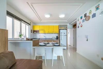 A cozinha ou kitchenette de Apto moderno e equipado Itapema PF2379