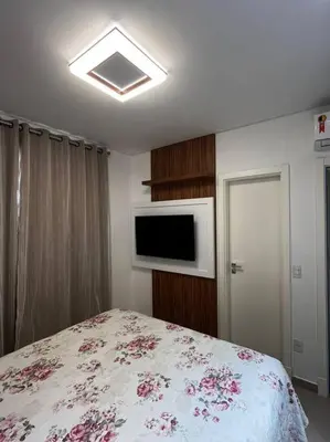 Uma cama ou camas num quarto em Duplex em Canto Grande