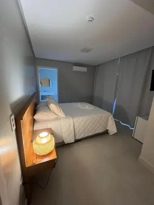 Uma cama ou camas num quarto em Pousada Águas de 4 Ilhas