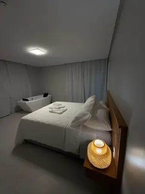 Uma cama ou camas num quarto em Pousada Águas de 4 Ilhas