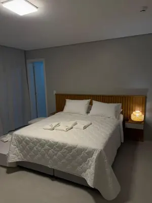 Uma cama ou camas num quarto em Pousada Águas de 4 Ilhas