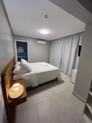 Uma cama ou camas num quarto em Pousada Águas de 4 Ilhas