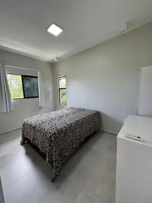 Uma cama ou camas num quarto em Casa Diamante