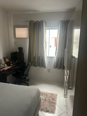 Uma área de estar em Apartamento em Bombas