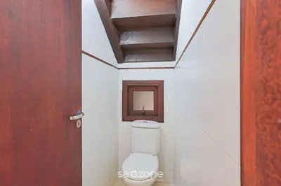 Uma casa de banho em Casa 3Q Pé na Areia c/ churrasq. Bombinhas SDN042