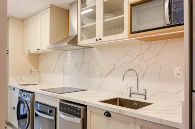 A cozinha ou kitchenette de Apartamento alto padrão com piscina em Bombinhas