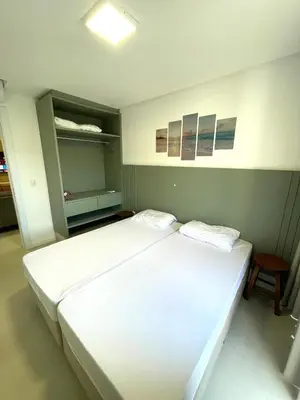 Uma cama ou camas num quarto em Linda Cobertura Duplex 3 suítes 150 metros do mar