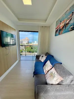 Uma área de estar em Linda Cobertura Duplex 4 Suítes 150 metros do mar, vila do sol