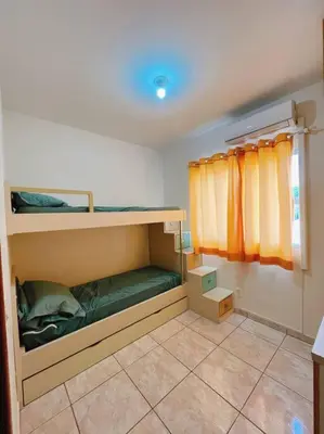 Uma casa de banho em Apê de frente para o mar, a 1 min da praia!