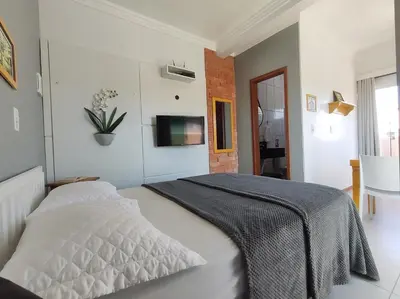 Uma cama ou camas num quarto em Residencial Batista