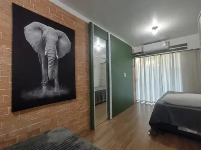 Uma cama ou camas num quarto em Residencial Batista