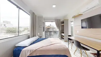 Uma cama ou camas num quarto em Residencial Batista