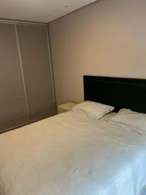 Uma cama ou camas num quarto em Pe na Areia Ap 2 quartos e terraço, Rua 3704