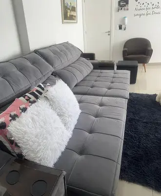 Uma área de estar em Apartamento com Piscina