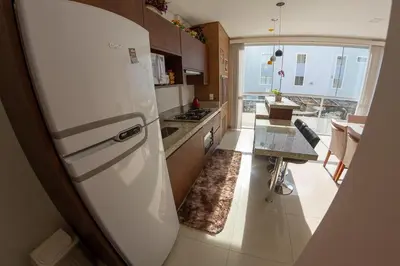 A cozinha ou kitchenette de Apartamento com Piscina