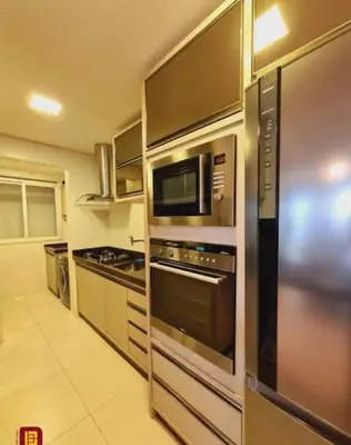 A cozinha ou kitchenette de Incrível apê 3 suites em Palmas