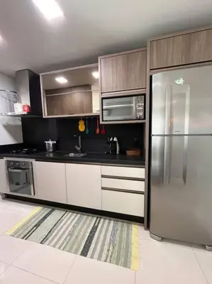 A cozinha ou kitchenette de Apartamento a 200m do mar!