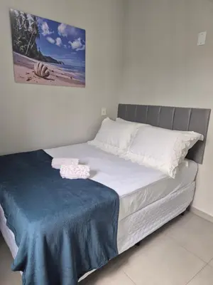 Uma cama ou camas num quarto em Casa Pescador