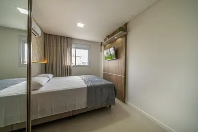 Uma cama ou camas num quarto em Residencial Caraíbas