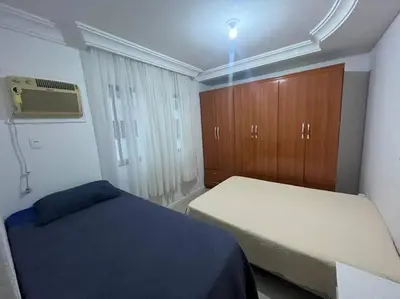 Uma cama ou camas num quarto em Apartamento Meia Praia - Quadra Mar 3 suítes