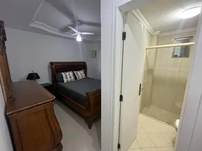Uma cama ou camas num quarto em Apartamento Meia Praia - Quadra Mar 3 suítes