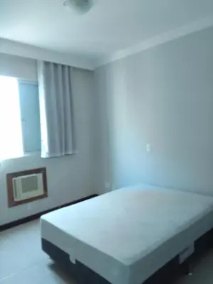 Uma cama ou camas num quarto em Apto 218