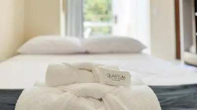 Uma cama ou camas num quarto em Cobertura com Piscina na praia de Bombas - BOM003