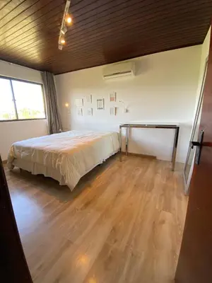 Uma cama ou camas num quarto em Casa de praia Canto Grande, Bombinhas