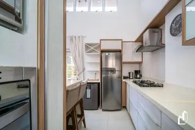 A cozinha ou kitchenette de Apartamento Garden para 06 pessoas em Mariscal