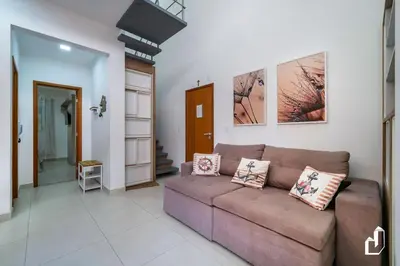 Uma área de estar em Apartamento Garden para 06 pessoas em Mariscal