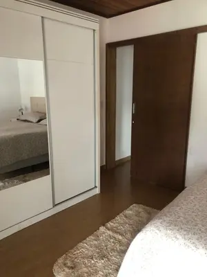 Uma cama ou camas num quarto em sobral