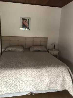 Uma cama ou camas num quarto em sobral