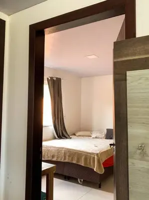 Uma cama ou camas num quarto em Aluguel de Verão em Porto Belo!