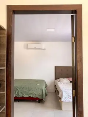 Uma cama ou camas num quarto em Aluguel de Verão em Porto Belo!