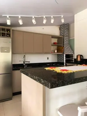 A cozinha ou kitchenette de Aluguel de Verão em Porto Belo!