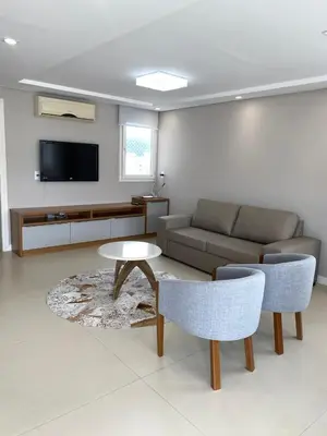 Uma televisão e/ou sistema de entretenimento em Cobertura duplex a 250m da praia de Bombas SC
