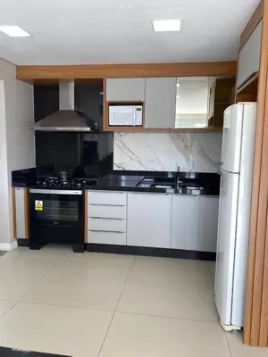 A cozinha ou kitchenette de Cobertura duplex a 250m da praia de Bombas SC