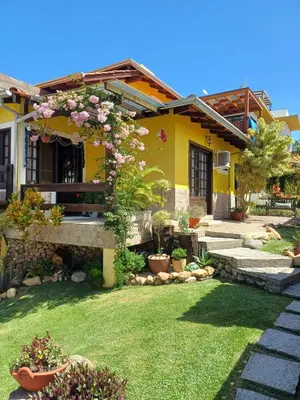 Um jardim no exterior de Suite Térrea