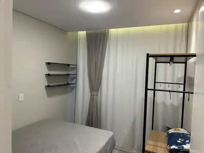Uma cama ou camas num quarto em Vista do Mangue suíte c Banheira Próximo do mar