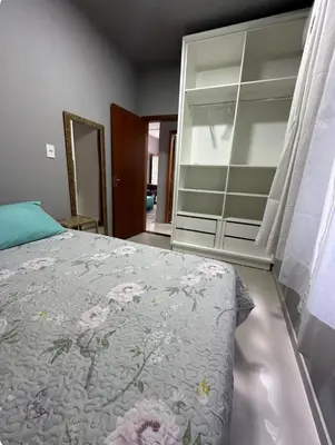 Uma cama ou camas num quarto em Casa na praia de bombas