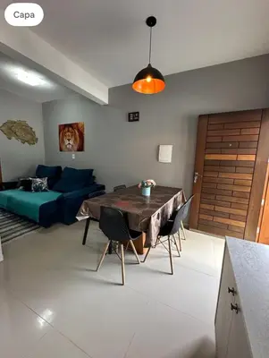 Uma área de estar em Casa na praia de bombas