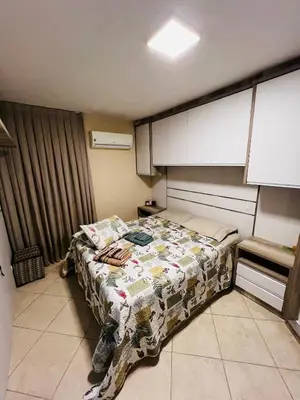 Uma cama ou camas num quarto em Apartamento Frente Mar Itapema
