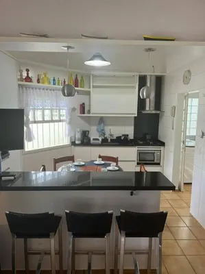 A cozinha ou kitchenette de Casa na Praia de Palmas com 3 Dormitórios Gov Celso Ramos SC