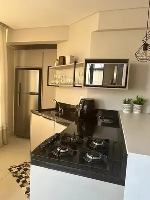 A cozinha ou kitchenette de Apartamento Moderno, Charmoso e Pertinho do Mar em Bombas