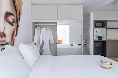 Uma cama ou camas num quarto em Up Hotel Boutique