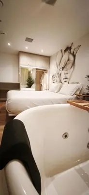 Uma cama ou camas num quarto em Up Hotel Boutique